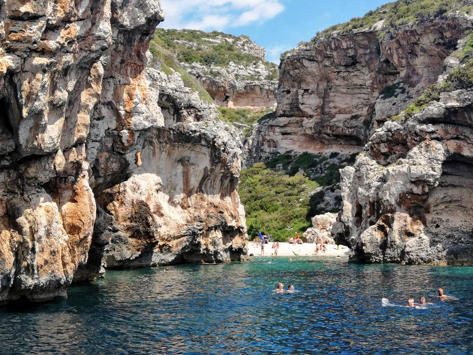Famous Stiniva beach with Blue Shark boat tour Blue Cave and Five Islands