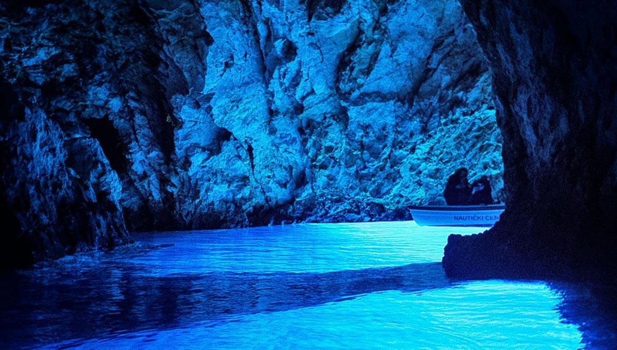 The light enters into the cave through a hole in the rock and creates an amazing blue glowing effect all around the cave and BLue Shark guests enjoy the moment