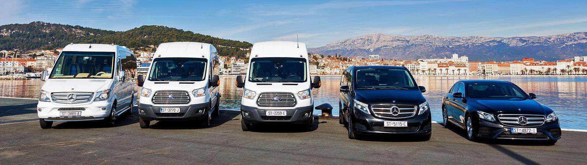 Blue Shark land transfer vehicles on parking place near waterfront in Split